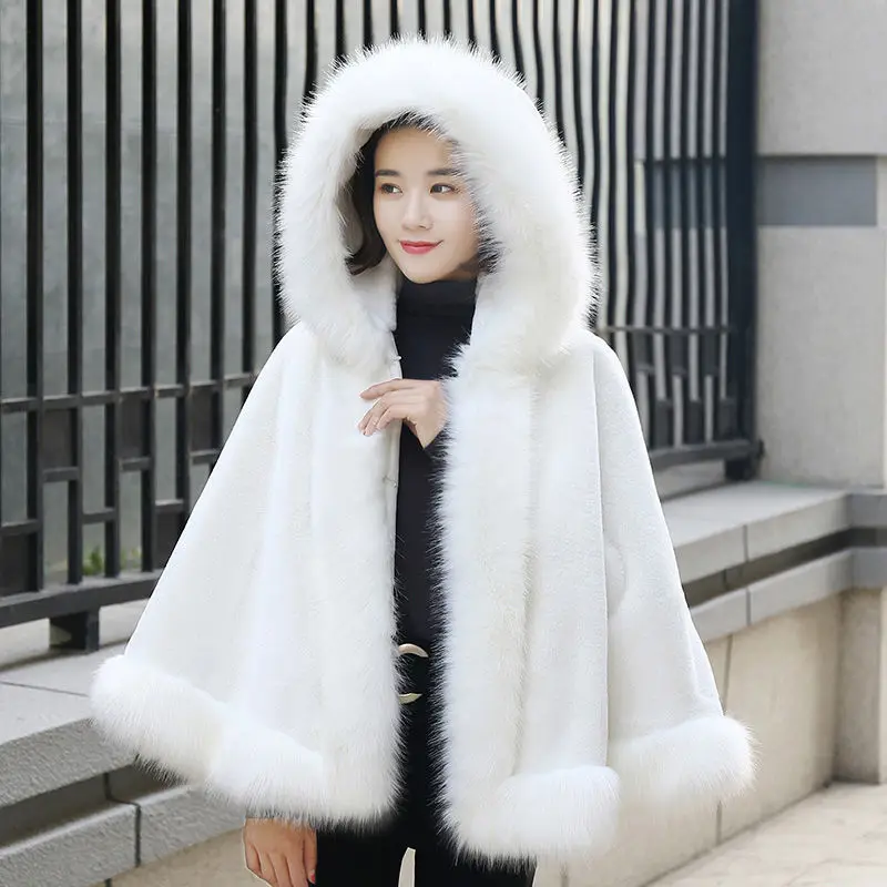 Nouvelle Cape à capuche coréenne hiver châle Outcoat fausse fourrure manteau mi-long fausse fourrure manteau à la mode et chaud pour les femmes vêtements pour femmes