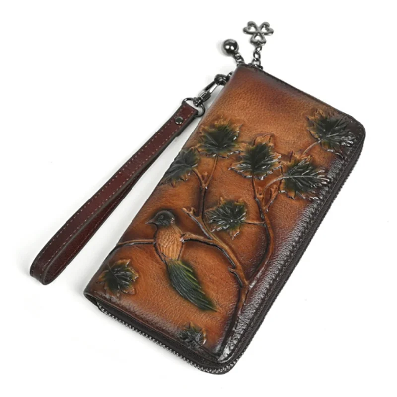 

Ethnic style men and women Wallet Engraved Retro Genuine Leather Wallet New Wristband Zipper Cell Phone Bag