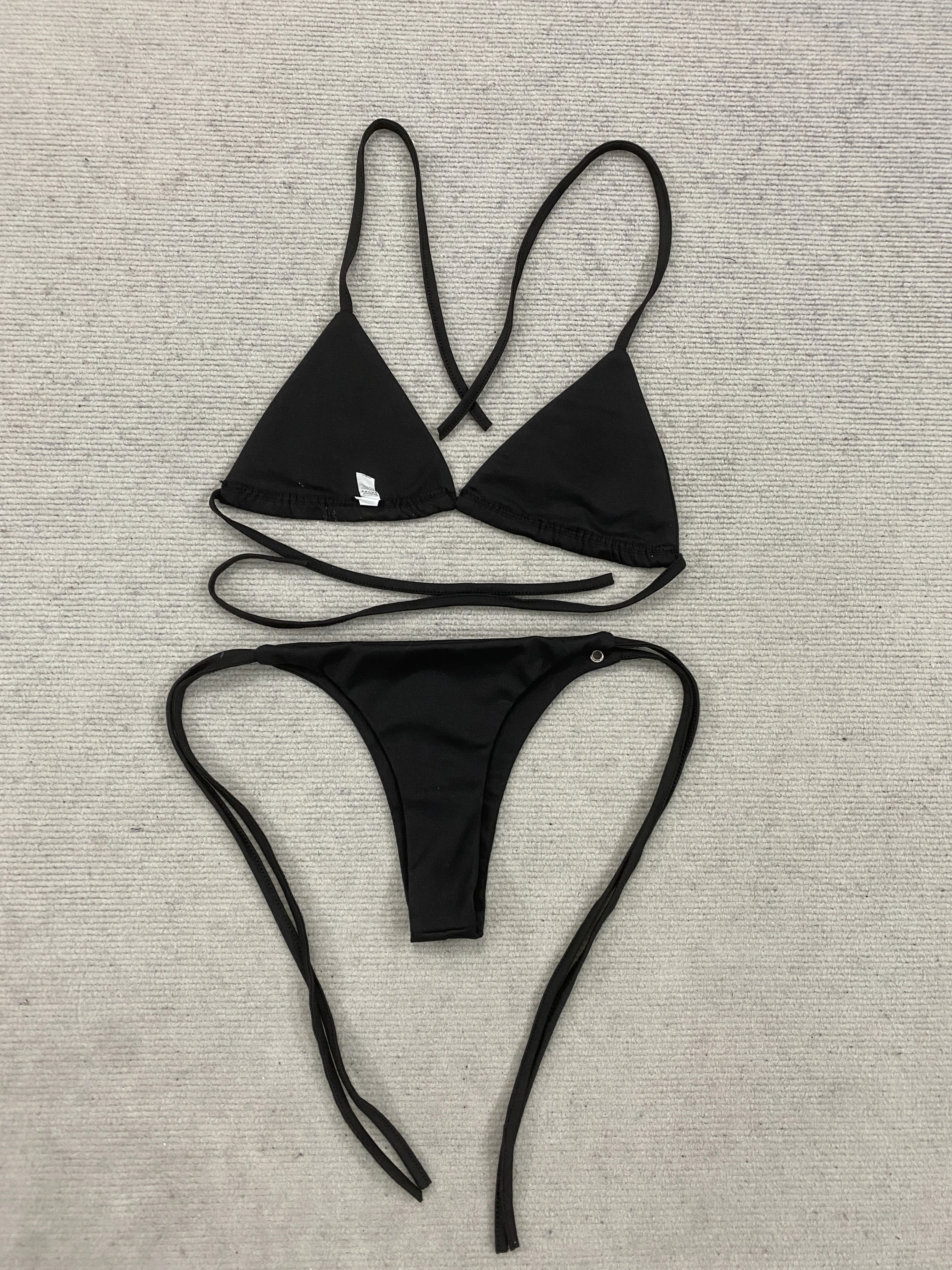 In the summer of 2026, the new dark gothic Y2K cross-printed strap hung neck and backless cross punk triangle cup swimsuit set.