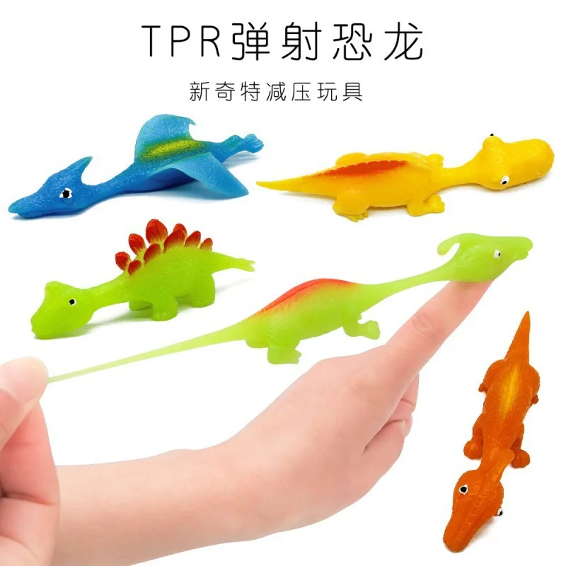 

Slingshot Dinosaur Finger Toys Party Favors for Kids Sticky Rubber Dino Flying Catapult Fidget Toys for Boys Girls