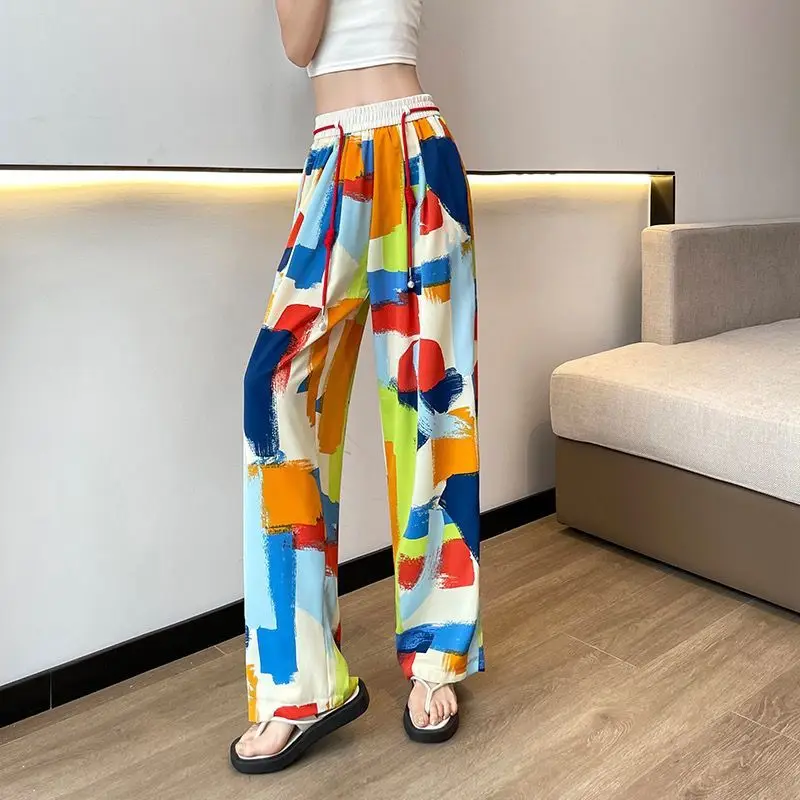 Designed tie dyed wide leg pants for women in 2023 summer, thin and colorful draped straight casual pants trend