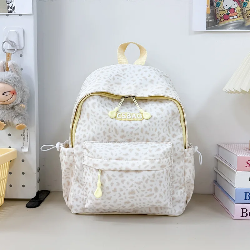 2025New leopard print backpack for female students, Korean versioninsHighly stylish, large-capacity casual and simple backpack