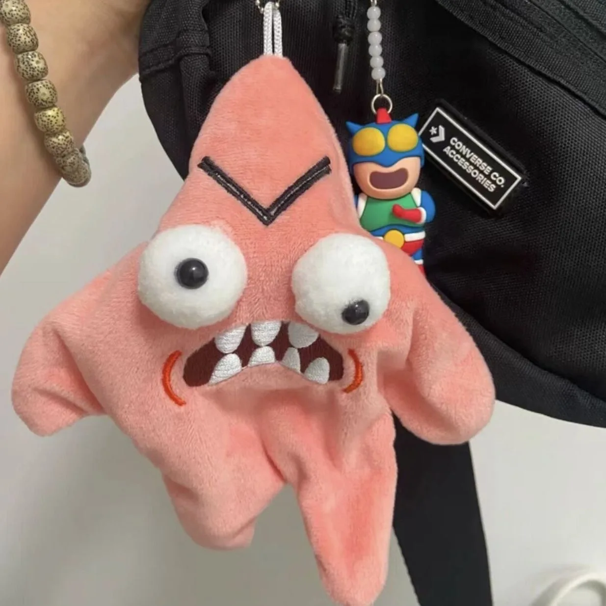 Angry Starfish Plüschtier mit springendem Bewegungslicht und Musik, lustiger Stressabbau, Stofftier-Rucksack-Schlüsselanhänger