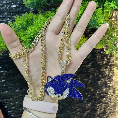 Dazzling Sonic Necklace: Gold chain + blue rhinestone - filled hedgehog pendant, perfect for gaming fans, cool bling accessory