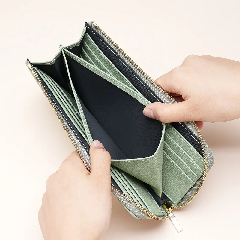 First layer cowhide leather women's wallet long seven character zipper high-quality and fashionable hand-held Coin wallet