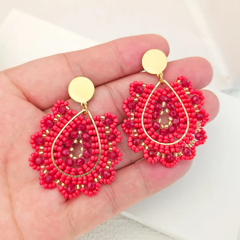 البوهيمي الأحمر قطرة الماء كريستال مطرز الأقراط، المنسوجة يدويا تصميم الدانتيل جوفاء، العصرية الإناث بسيطة سبيكة الأرز حبة المجوهرات