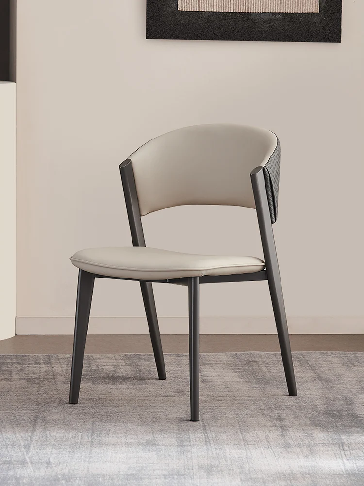 

Italian minimalist dining chair Simple modern luxury armchair Hotel talks about dining table and chair combination dining stool.