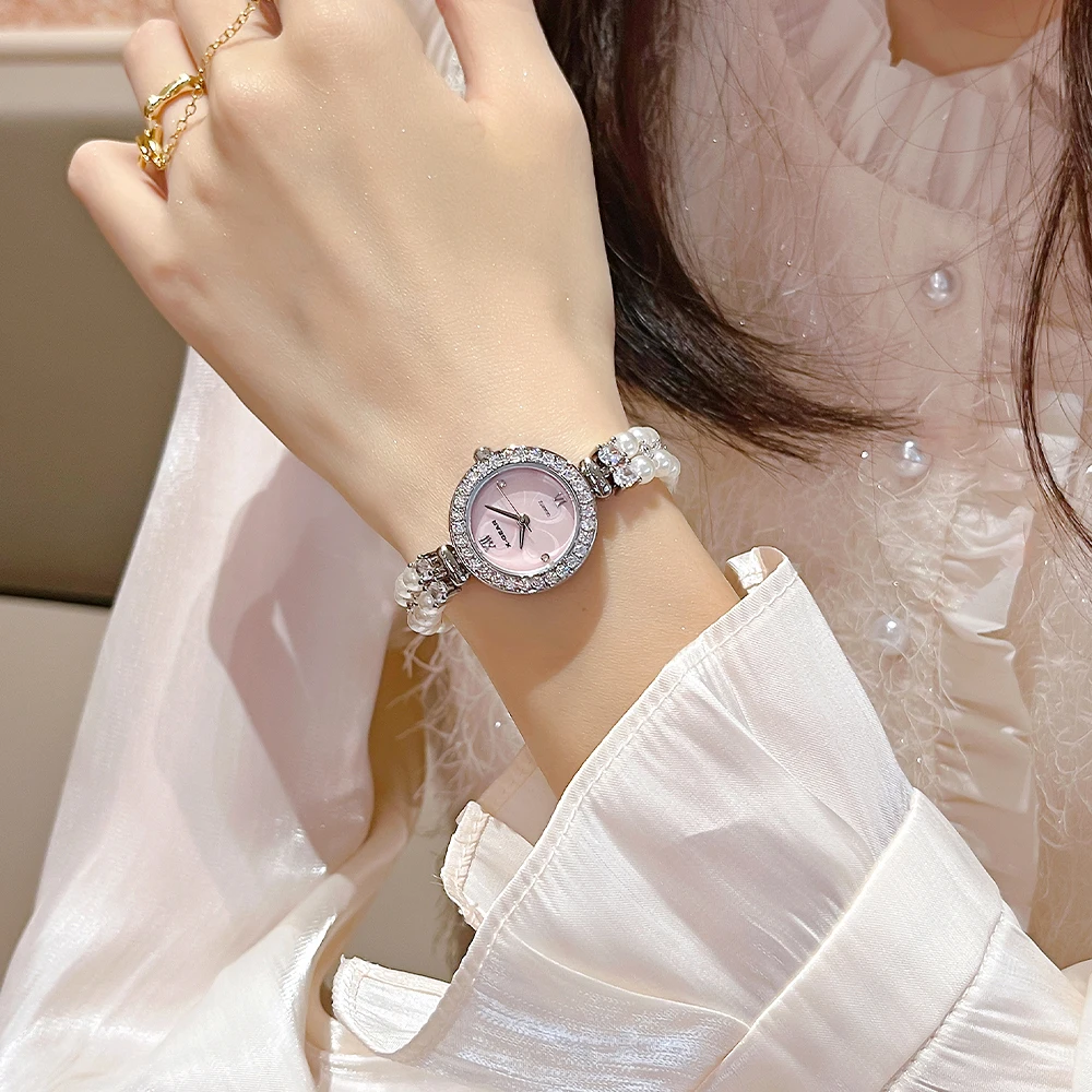 ساعة X-GEAR النسائية الأنيقة باللؤلؤ - ساعة يد كوارتز فاخرة مع سوار من الفولاذ المقاوم للصدأ