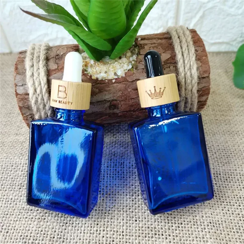 

whosesale rectangle empty dropper bottle matte frosted whitel black red blue green colourful square dropper bottles bamboo lid