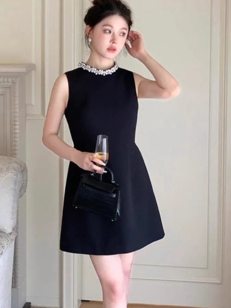 

Summer New French Pearl O Neck Hepburn Style Dress Women's Waist Up Sleeveless A-line Small Black Dress with High Grade Feeling