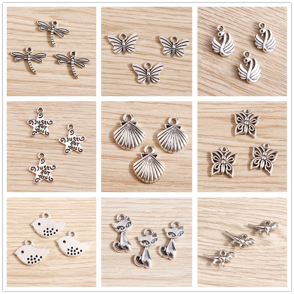 Tusember 50 Stück Legierungs-Tieranhänger Taube Katze Schwan Schmetterling Dinosaurier Muschel-Anhänger für Armbänder Halsketten DIY Schmuckherstellung – Detail 1