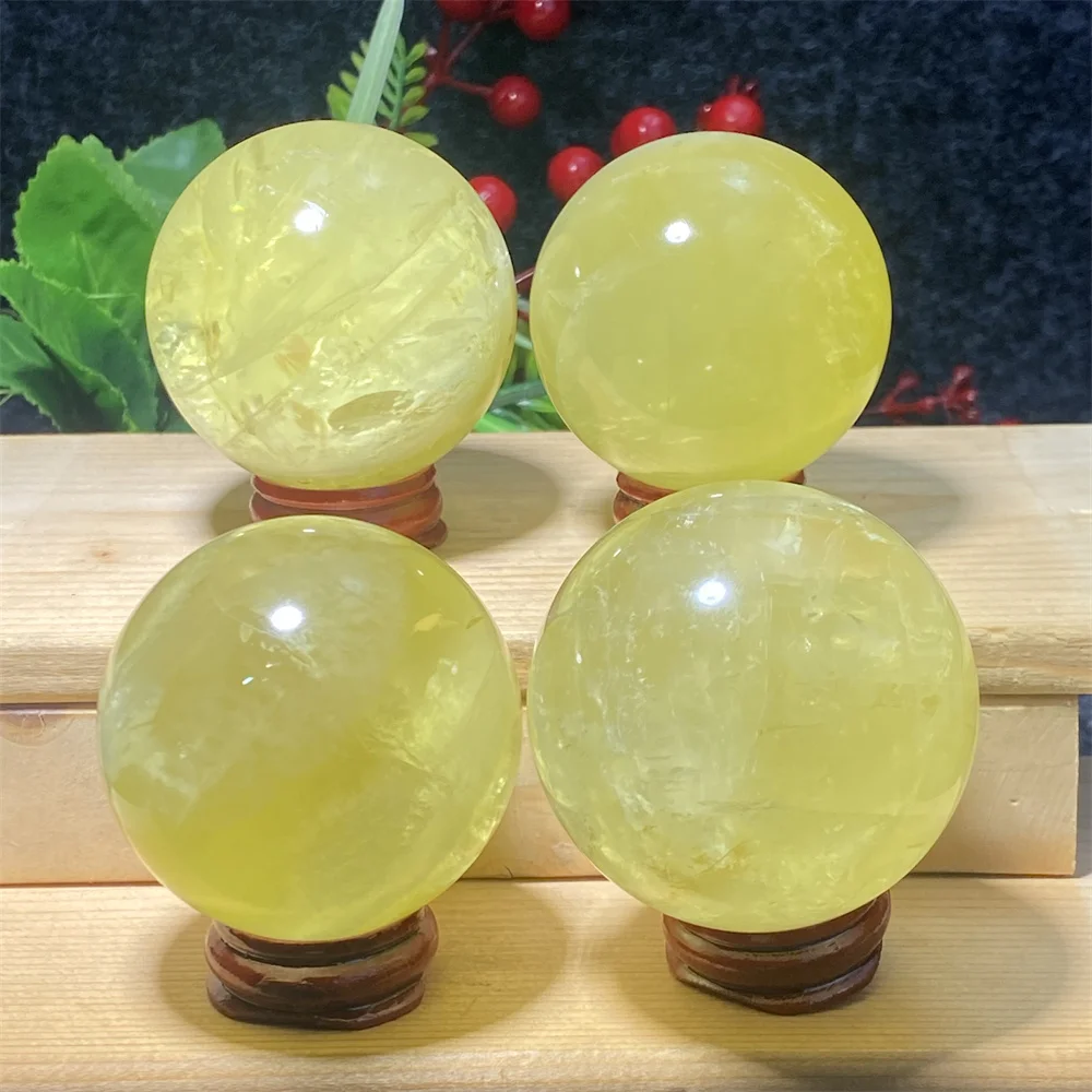 

Pure Natural Yellow Crystal Ball Hand-Polished The Original Stone Hole Office Degaussing Feng Shui Evil Spirit Home Decoration