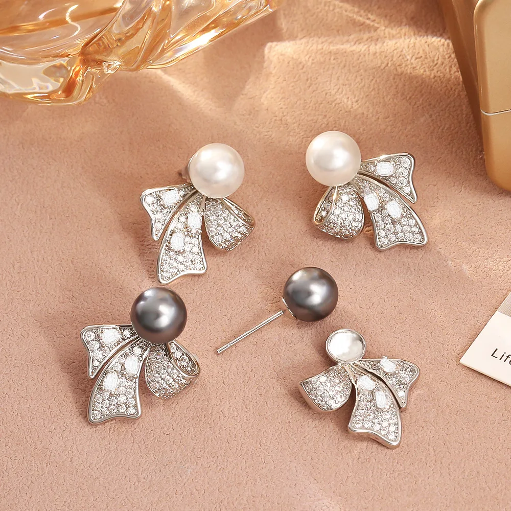 

Fashionable and Exquisite Bow Pearl Earrings Retro Elegant Temperament Earrings Niche Light Luxury Design Earrings for Women