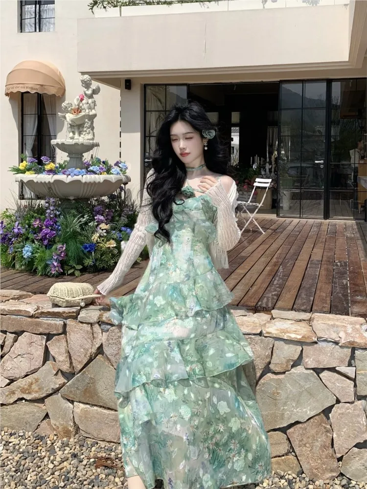 

A and elegant floral layering ruffled flowing cinched-waist halter dress