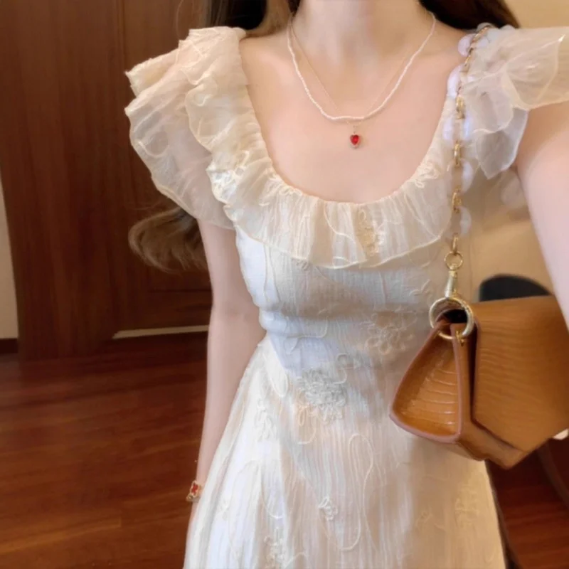 

French-style Summer Apricot Small Flutter Sleeve Dress for Women2025New style beach vacation Yunnan travel outfit long dress