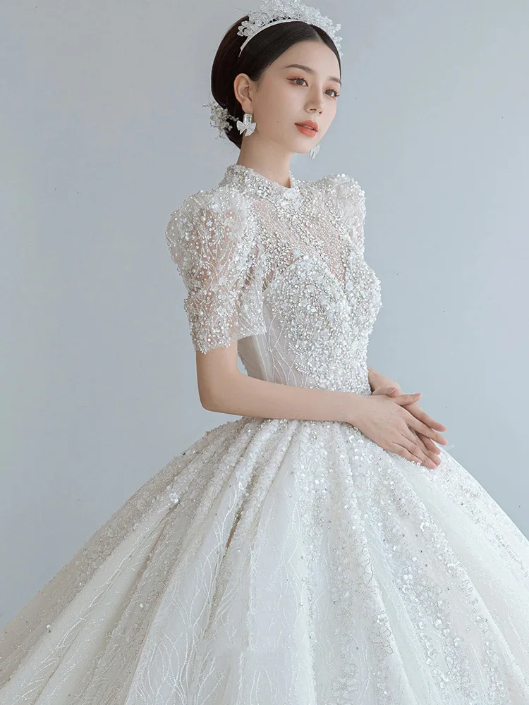 

Luxury White Wedding Dress Beading Sequined Applique Puff Sleeve Illusion Sweetheart Retro Tailing Shiny Palace Bridal Ball Gown