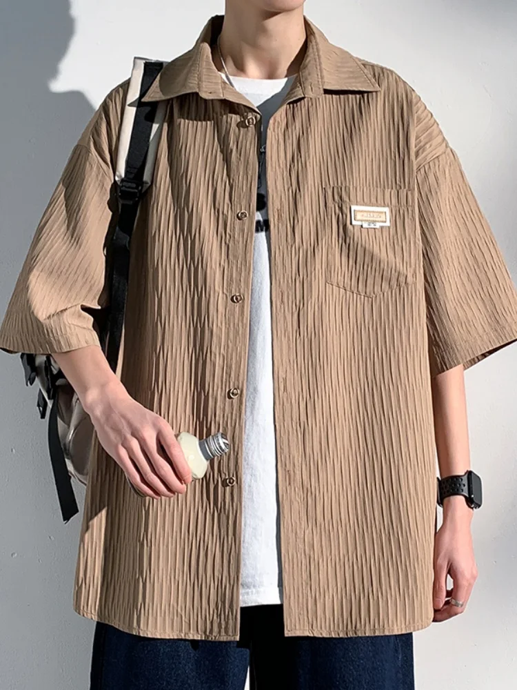 

Текстурированная мужская рубашка с коротким рукавом, тонкая, дышащая, летняя, молодежная, модная, повседневная, свободного кроя, на пуговицах