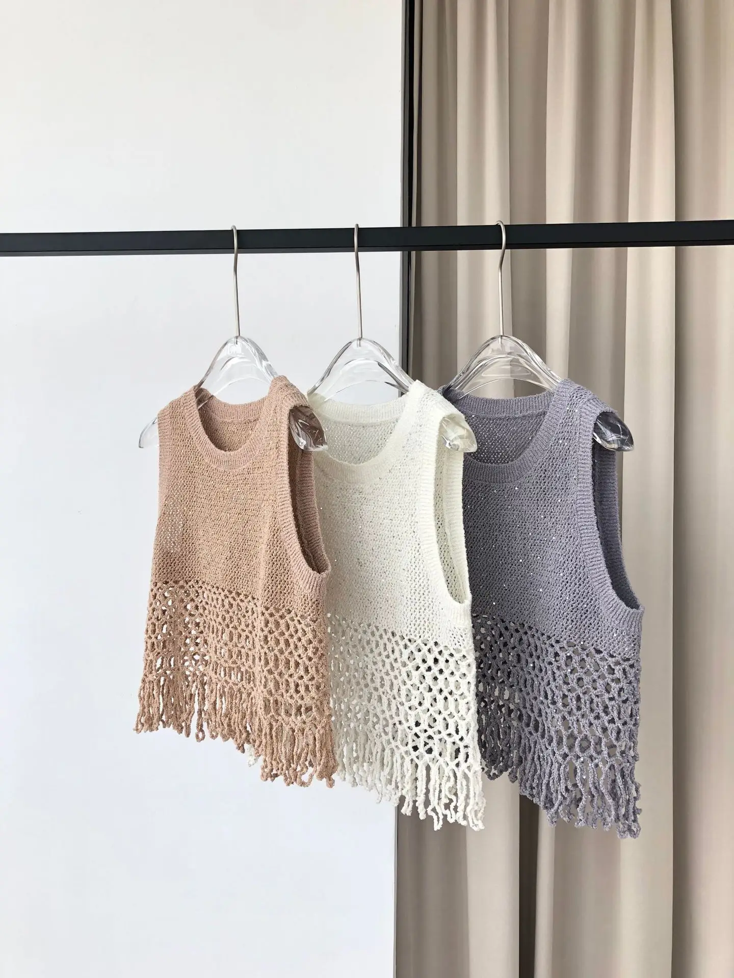 

Women Knitted Vest Tassels Spliced Hollow Out O-Neck Sleeveless Fashion Female Sweater