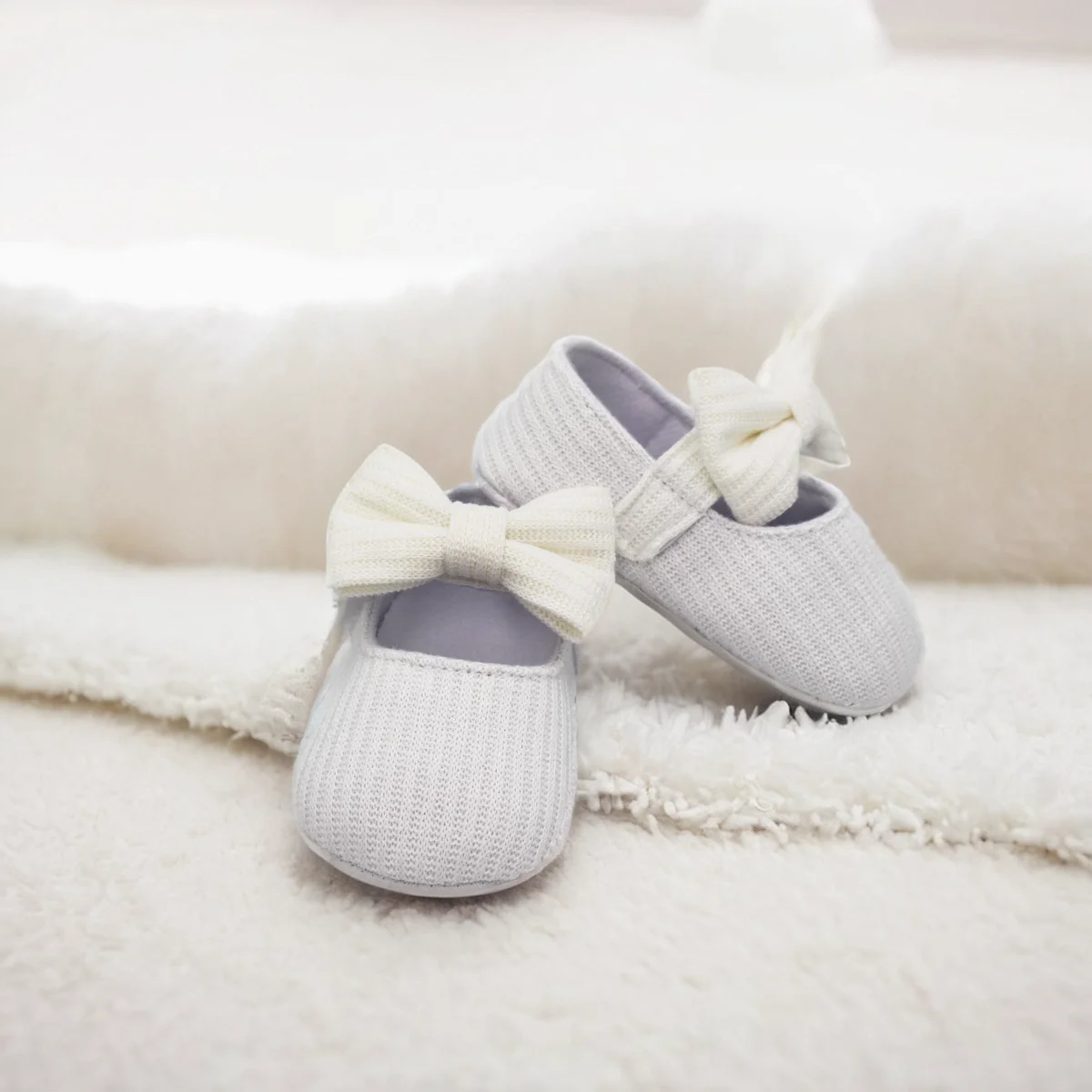 A Pair of Fashionable, Comfortable, Cute, and Good-looking Black Baby Flat Shoes with Bows New