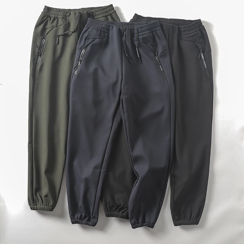 

Мужские спортивные брюки на флисовой подкладке, ветрозащитные, осенне-зимние, свободного кроя, с карманами на молнии, с проклеенными швами, повседневные длинные брюки