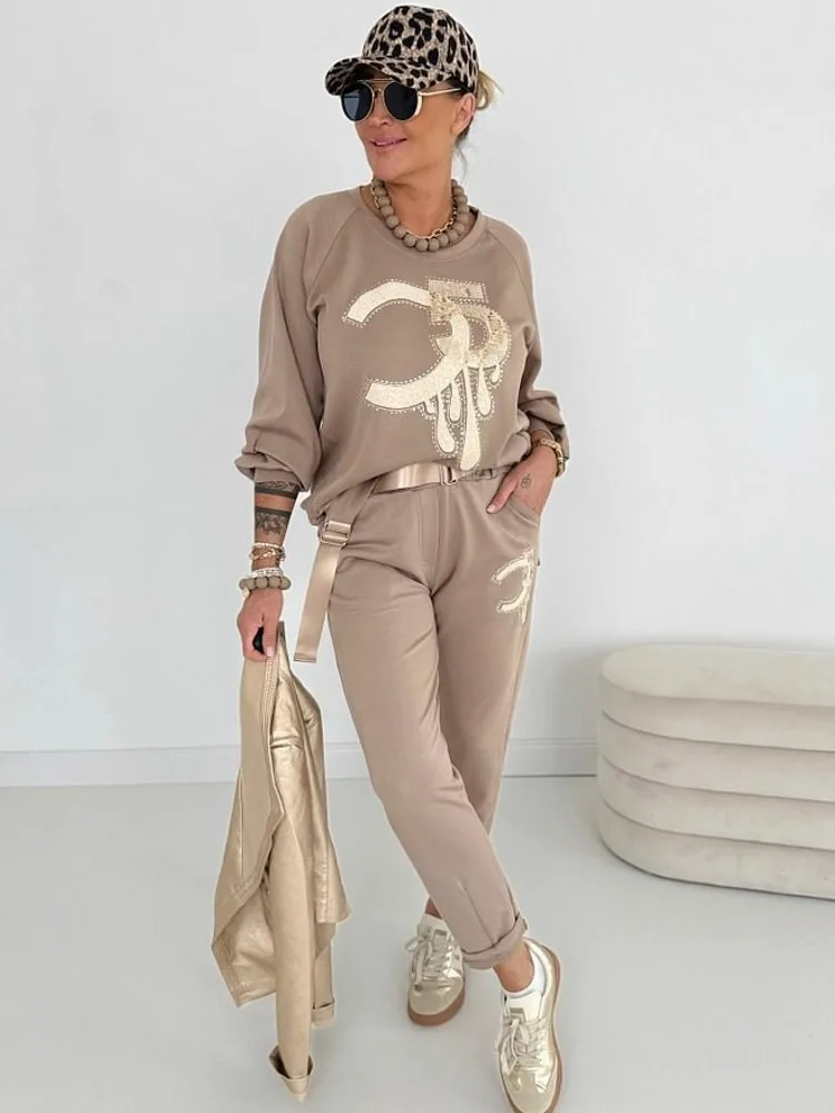 Set da donna da 2 pezzi 2025 Nuovo arrivo Autunno Inverno Set coordinati Set da due pezzi Top a maniche lunghe e pantaloni Abiti Abiti Abbigliamento