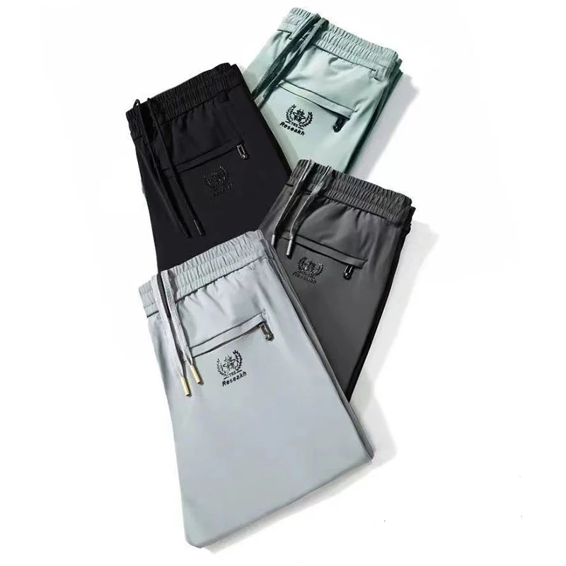 Fashion Solid Color Zipper Pockets Letter Casual Pants Men's Clothing 2024 Summer New Loose Elastic High Waist Cropped Pants