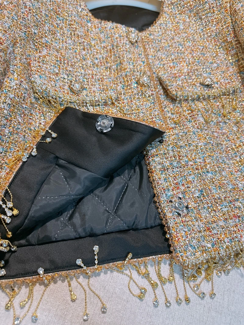   เสื้อโค้ทขนเฟอร์เทียมแบบไม่มีลายเย็บติดกัน พร้อมพู่ห้อย สไตล์ฝรั่งเศส ทรงเข้ารูปสำหรับผู้หญิง เสื้อคลุมฤดูใบไม้ร่วง ทำจากเส้นใยโพลีเอสเตอร์