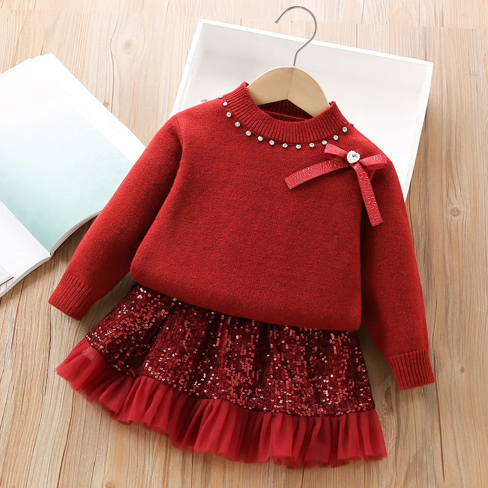 The new sweet and cute girl set Korean version of the knitted jacket+sequins short skirt girl spring set is suitable 2-6 year ol