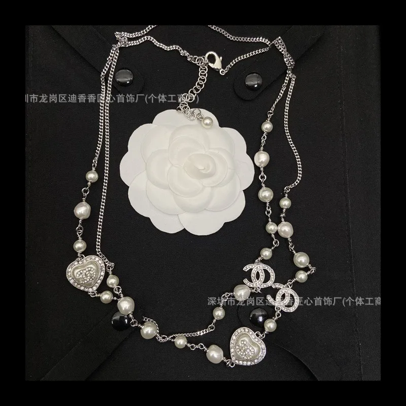 chaine-de-pull-double-amour-collier-polyvalent-a-haut-sens-perle-de-temperament-a-la-mode-pour-femmes