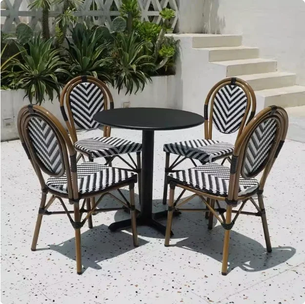 

A Terrace Stackable Wicker Bistro Chairs Vintage Outdoor Restaurant Wedding French Garden Cafe Dining Chairs and Hotel Table Se