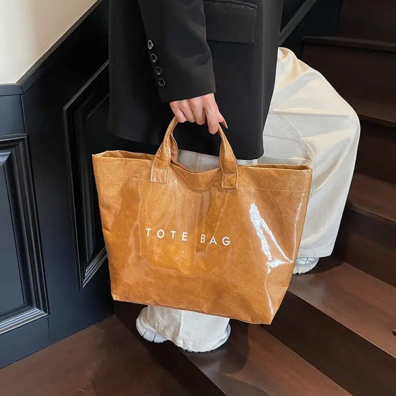 

New arrival large capacity dupont paper satchel transparent anti-fruit jelly pvc work clothing travel bag outing satchel bag