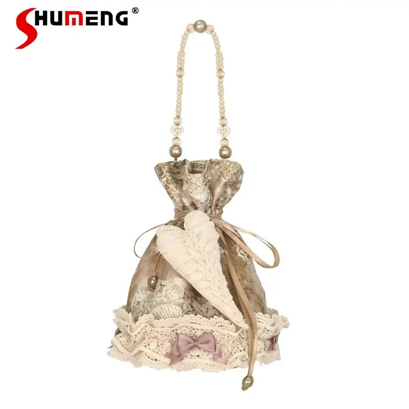

2025 Summer New Chic Small Drawstring Bags Unique Design Love Retro Elegant French Style Fabric Handbag Bundle Bag For Ladies