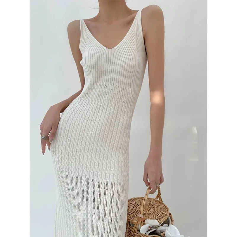 

V-neck hollowed-out knitted suspender dress for women, slim-fitting and thin temperament, sexy and pure hip-wrapped long dress