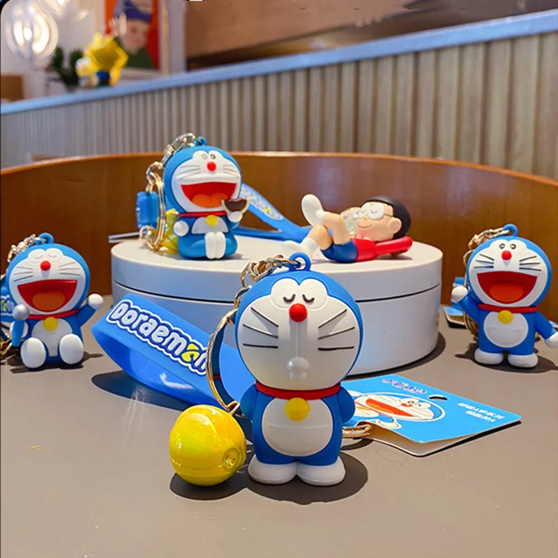 Lindo Doraemon llaveros PVC dibujos animados Nobita gato Doraemon Anime figuras creativo coche bolsa colgante llavero regalo juguete para niños adultos