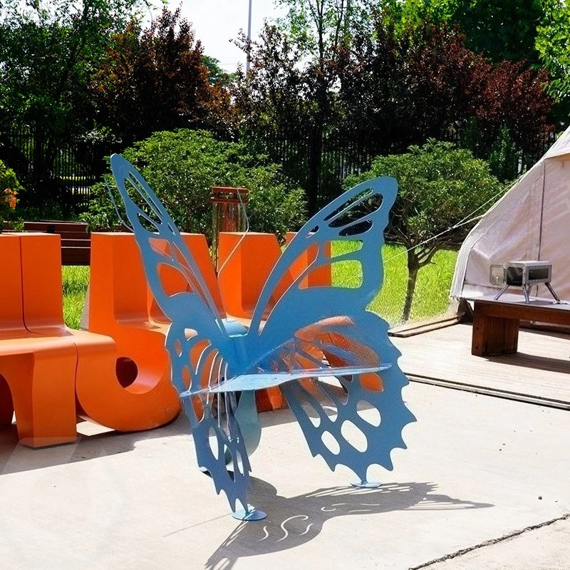 

Wrought iron butterfly seat sculpture outdoor seat square park city campus landscape logo seat