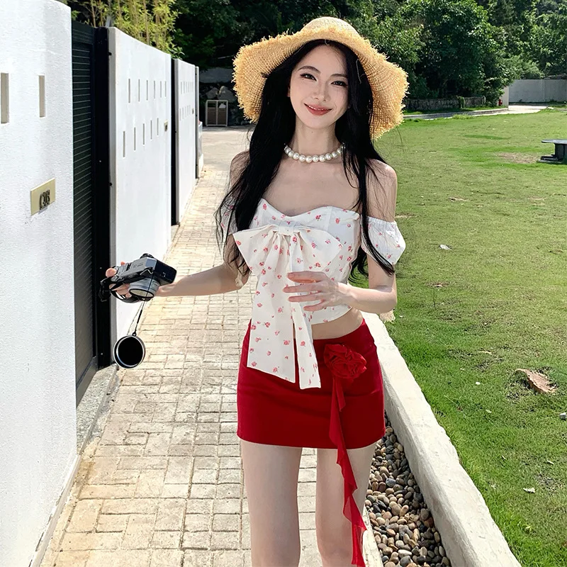 2026 Vacation Style Summer New Hot Selling One Shoulder Small Floral Bow Top and Red Short Skirt Two-piece Set