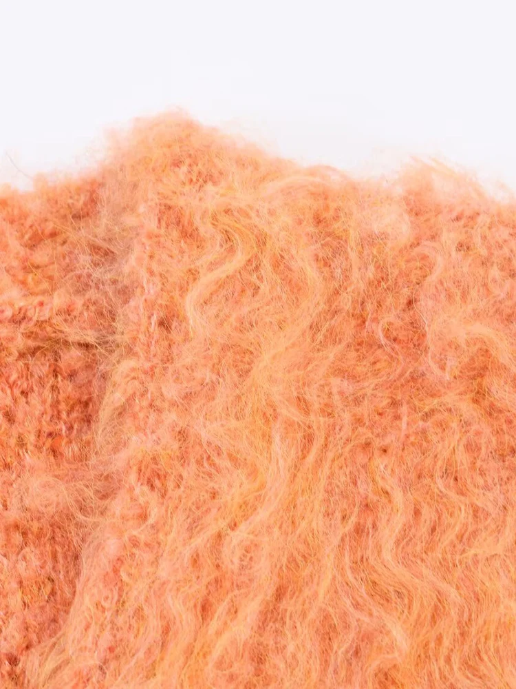 Nuovo gilet alla moda da donna in stile europeo, versatile ed elegante, cardigan lavorato a maglia dai capelli lunghi in tinta unita.