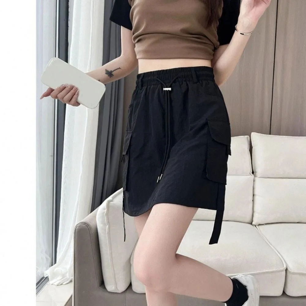 الصلبة اللون فضفاض تنورة عالية الخصر الدانتيل يصل جيب كبير واسعة نصف الساق التنانير الرباط حار فتاة نمط البضائع التنانير الشارع الشهير