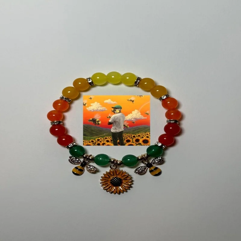 نحلة عباد الشمس |   تايلر سوار الخالق |   سوار الألبوم |   سوار حبة المغني |