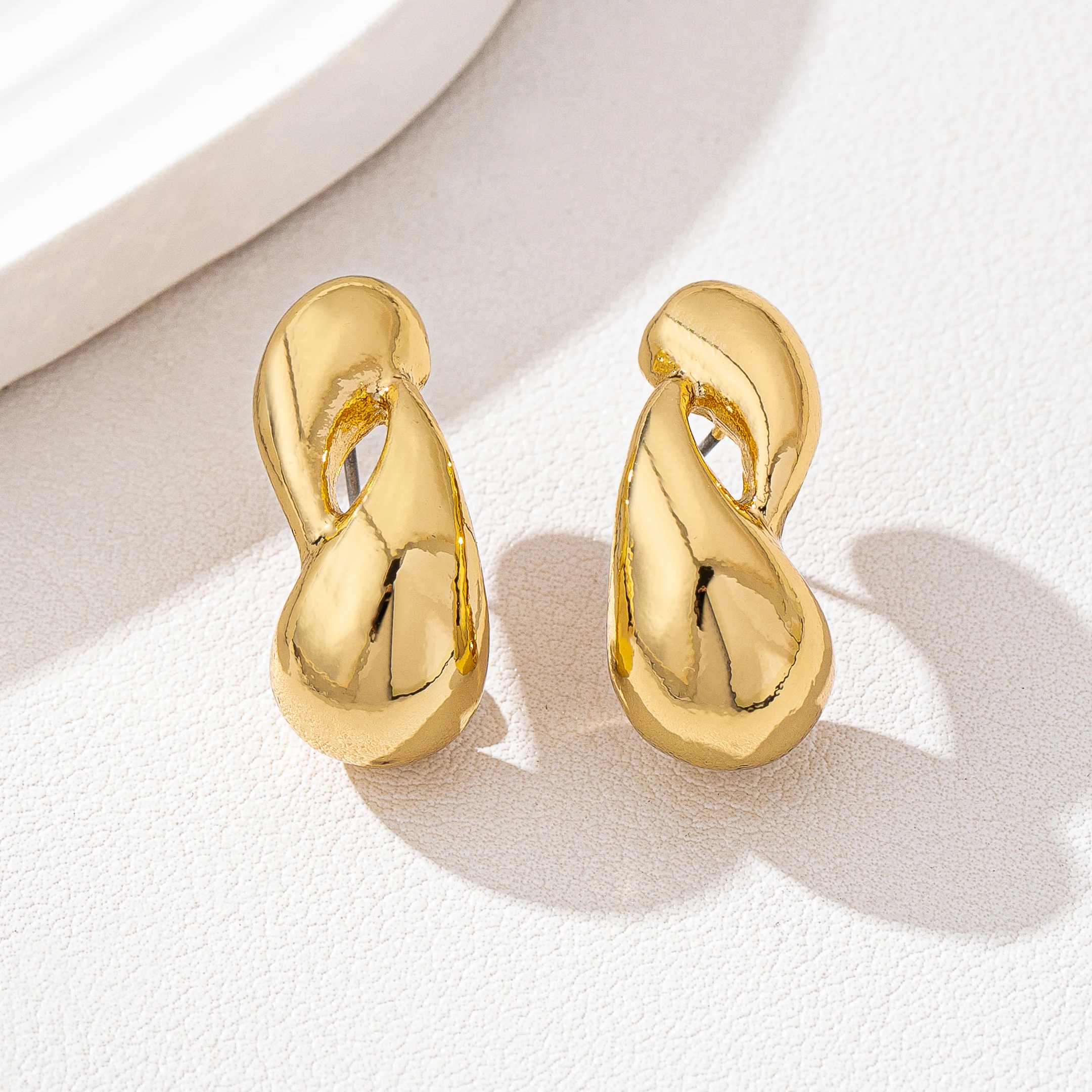 

Simple temperament metal texture fashionable commuting cross-sized water drop earrings, vacation travel jewelry