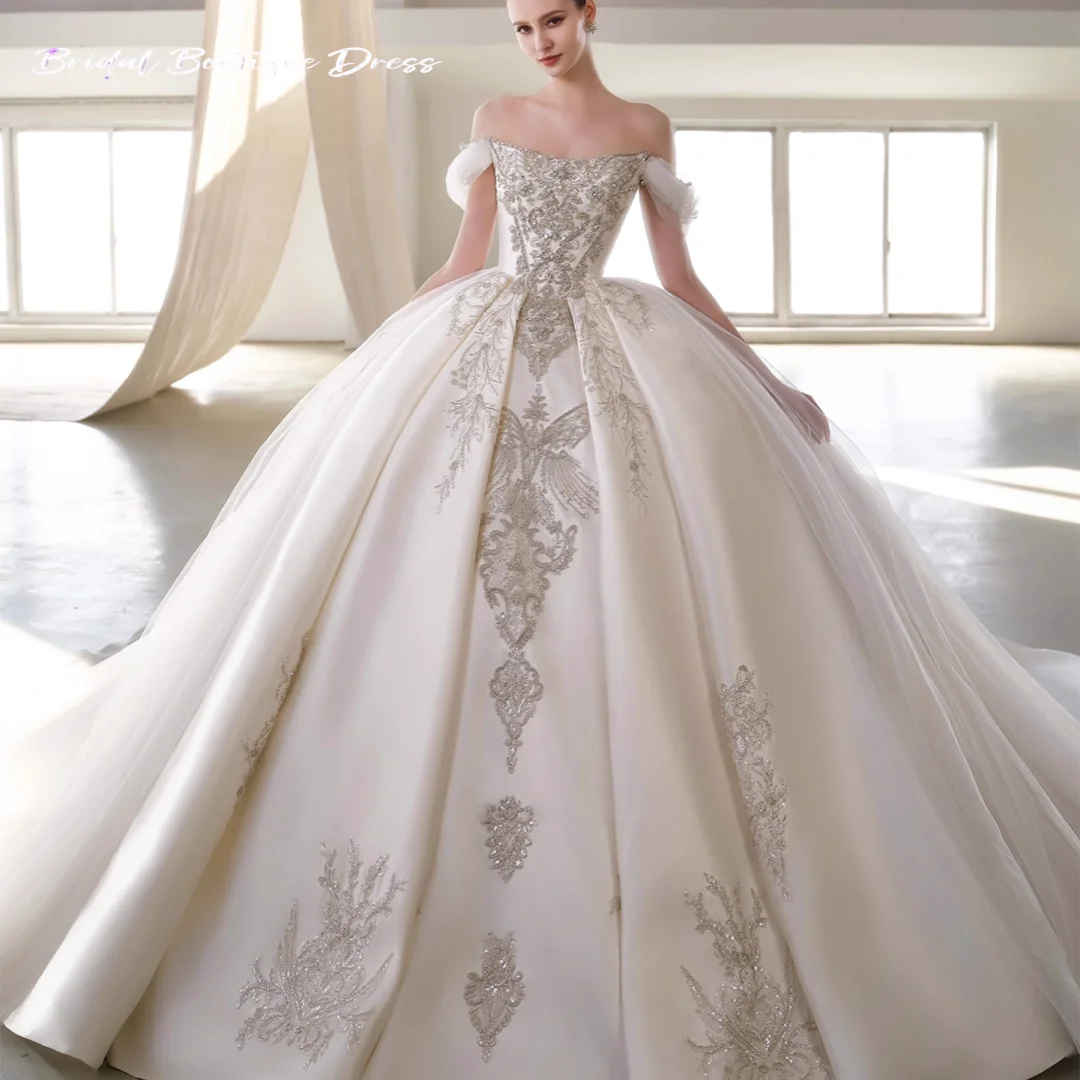 Abito da sposa senza spalline in raso elegante personalizzato senza maniche ricamo di lusso principessa abito da sposa con perline scintillanti abiti