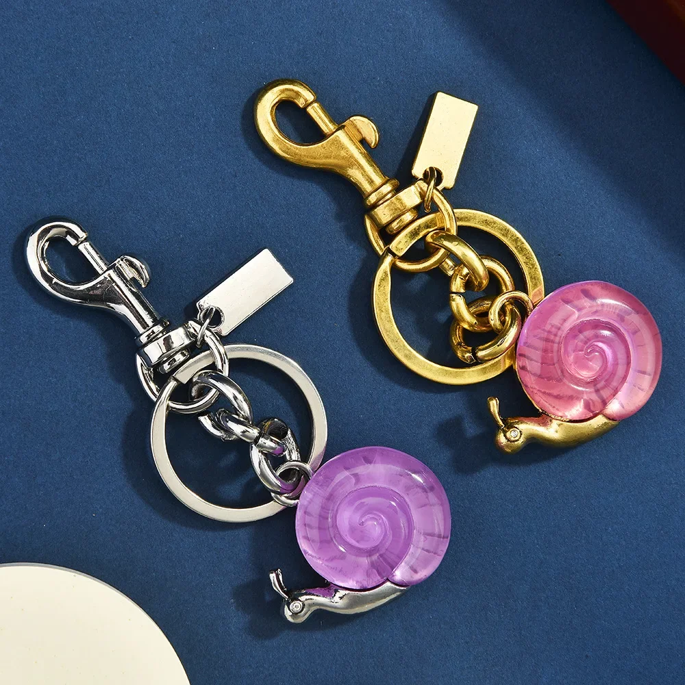 

His chalcedony snail bag key chain imitation resin women's bag pendant is cute and a bag accessory