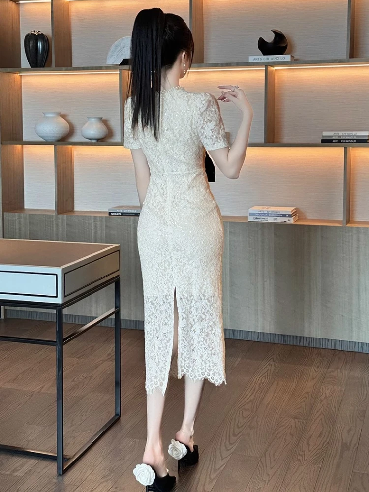 Robe longue en dentelle pour femmes, tempérament français, élégante, célébrité, perlée, col rond, manches courtes, taille haute, enveloppée dans les hanches, été