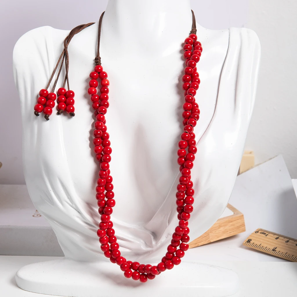 Handgefertigte rote Keramikperlen-Twist-Halskette, verstellbare Wachsschnur, böhmischer ethnischer langer Statement-Schmuck