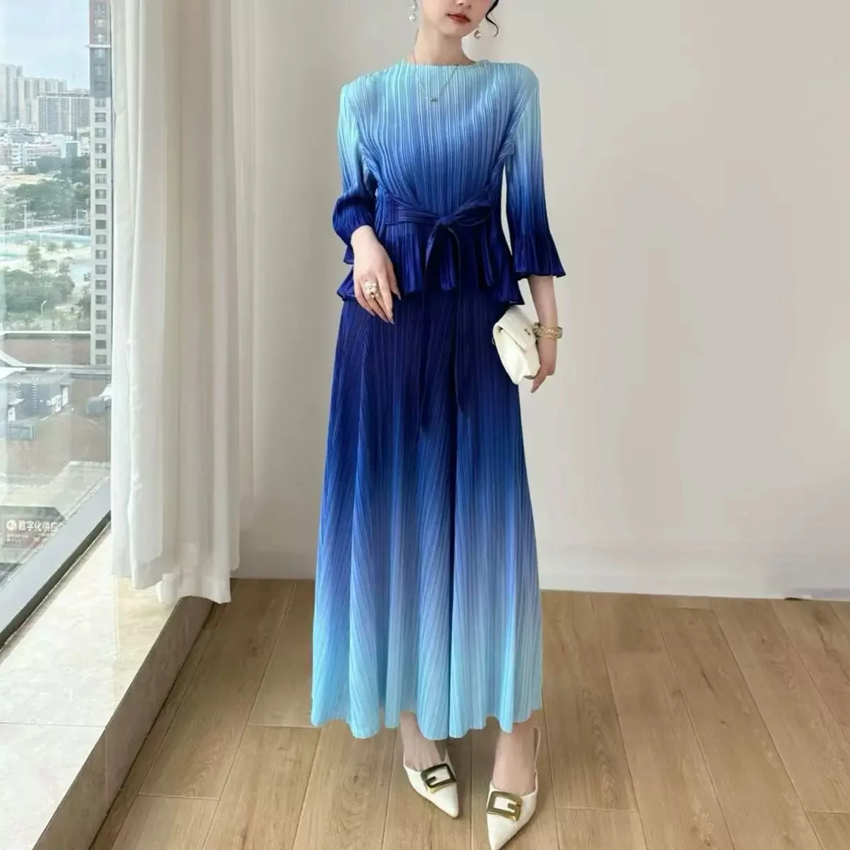 Miyake Pieghe 2025 Abito di fascia alta da donna primaverile Nuova moda T-shirt a cambiamento graduale Gonna a pieghe Set da due pezzi