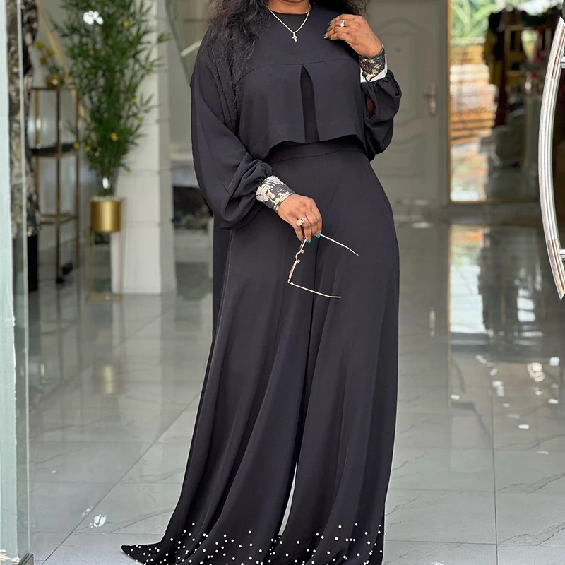 

Повседневный свободный комплект, новые топы с круглым вырезом и нерегулярными рукавами-фонариками и широкие брюки, темпераментные однотонные наряды с украшением из бисера