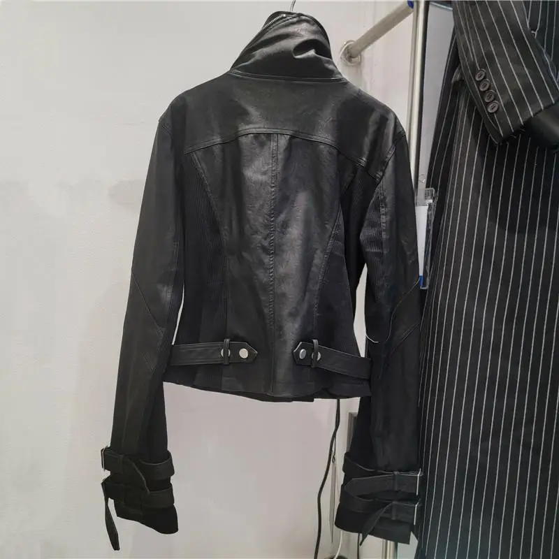 

2025 Fall motorcycle jacket. Chic ribbed panels & stand collar. Slim-fit, edgy yet versatile statement piece.