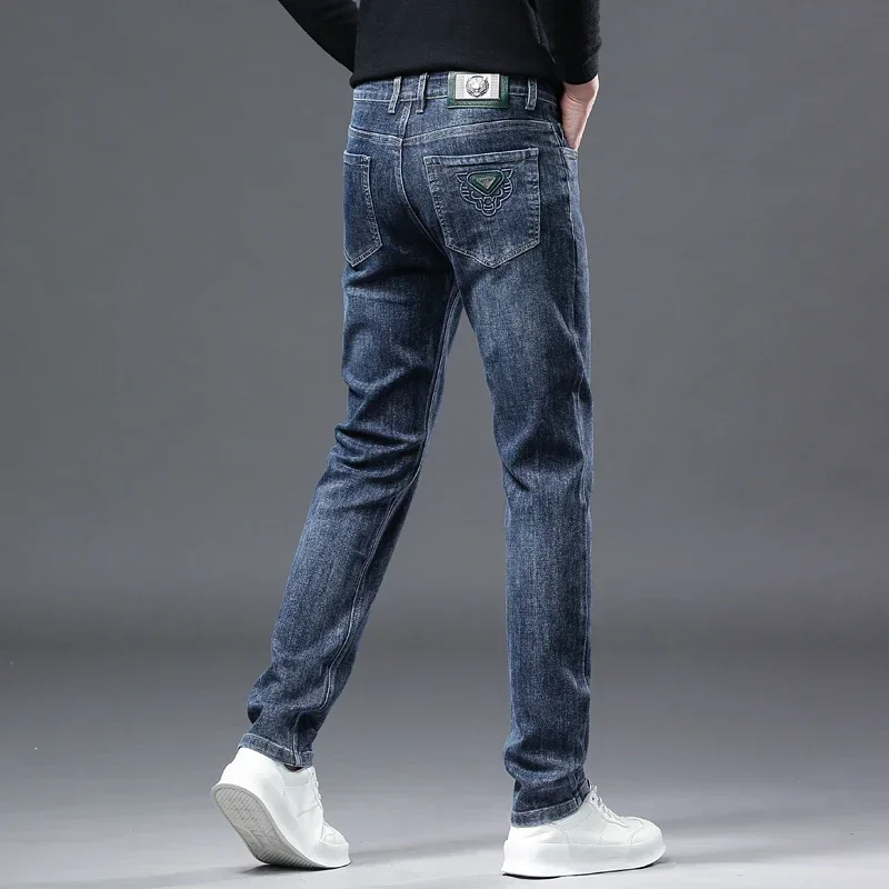 2024 Pantaloni lunghi elasticizzati larghi casual da uomo d'affari di marca di moda Four Seasons