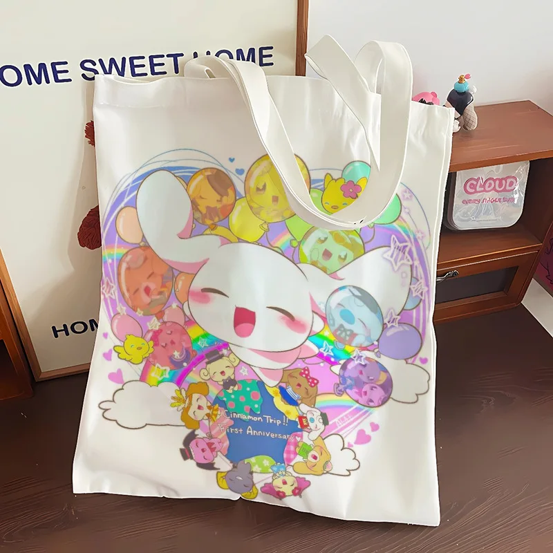 SANRIO Cinnamoroll การ์ตูนกระเป๋าสะพายไหล่กลางแจ้ง Kawaii ถุงกระเป๋าผ้าใบกระเป๋าใส่เหรียญที่เก็บขนมขบเคี้ยวของเล่นของขวัญสาว