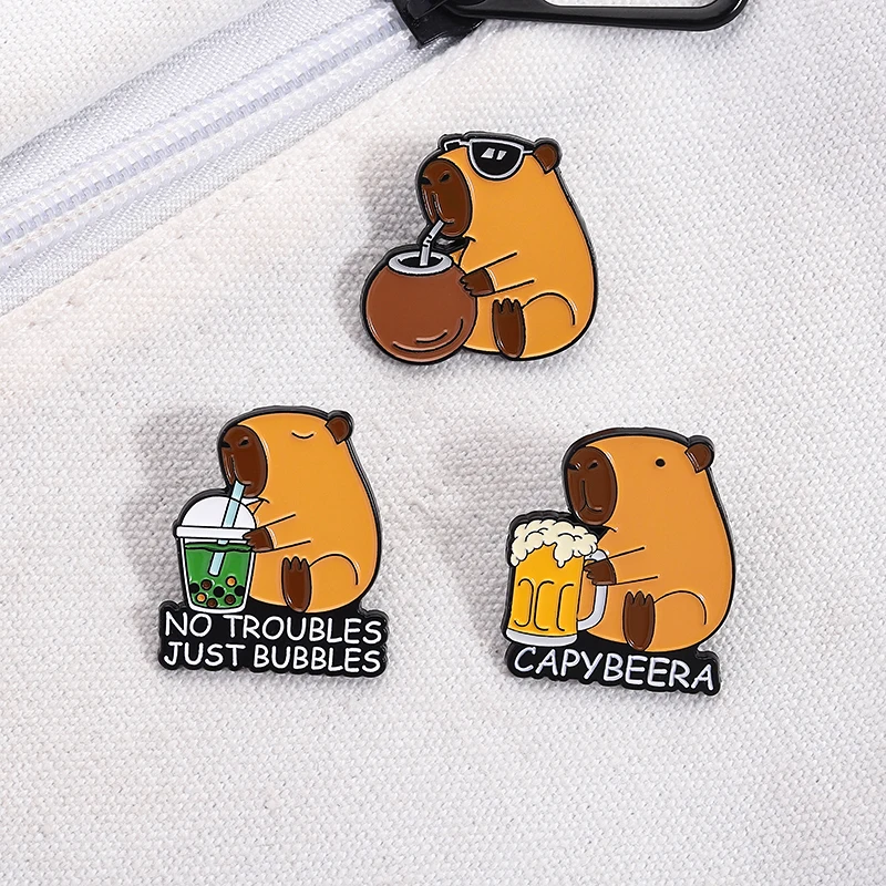 

Cute Capybara Drinking Beer Milk Tea Enamel Pins Custom Capybeera No Troubles Just Bubbles Brooches Lapel Badge Jewelry Gifts
